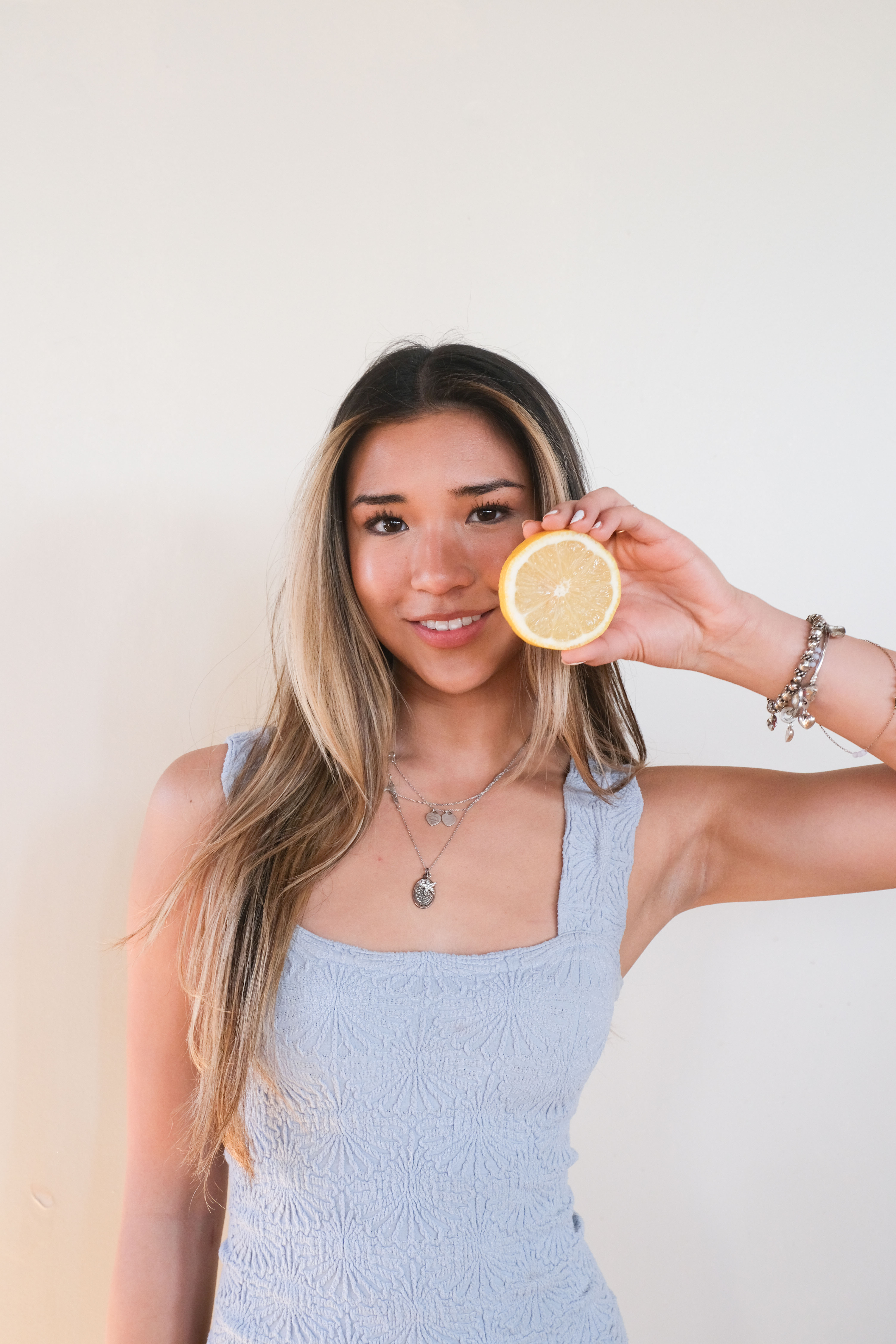 Sophia holding a lemon slice